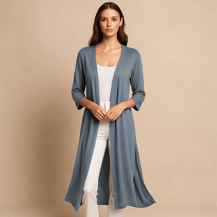 Women's long knitted cardigan: cozy, stylish everyday wear. Perfect layering piece for comfort.