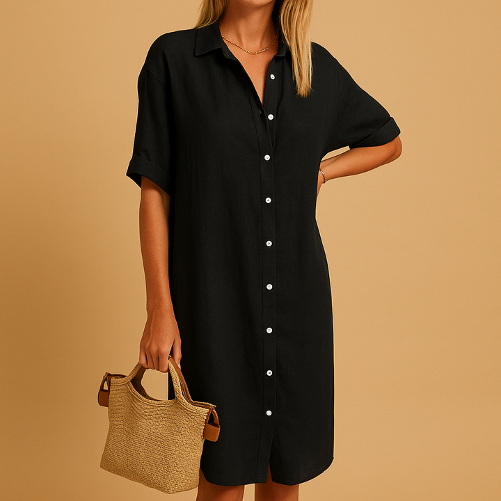 Women's flowy short sleeve shirt dress in a vibrant color, perfect for casual summer elegance. Comfortable & versatile.