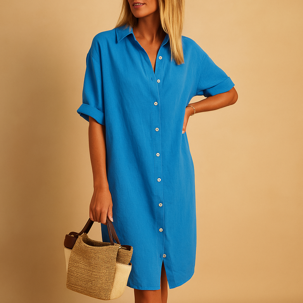 Close-up of a women's flowy short sleeve shirt dress, showcasing its soft fabric and comfortable drape. Summer fashion.