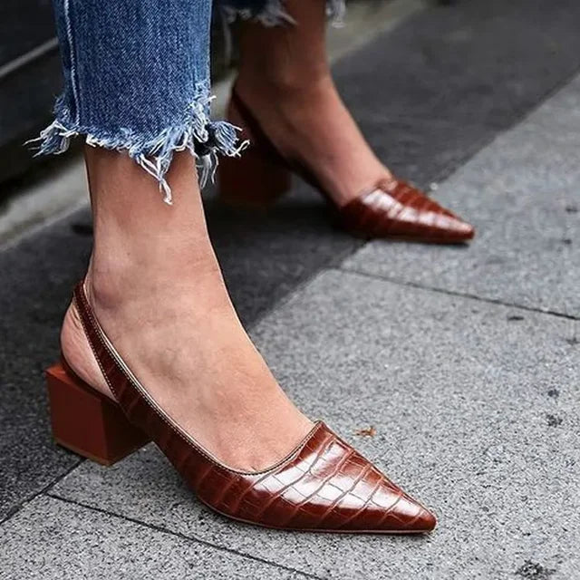 Elegant women's orthopedic pumps in sophisticated croco design, offering comfortable support for daily wear.