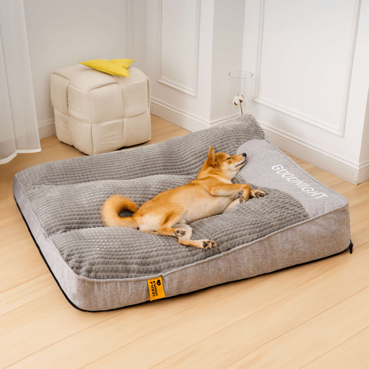 Dog accessory: large gray orthopedic pet bed with neck support & durable washable cover for maximum comfort.