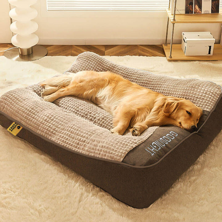 Gray orthopedic dog cushion for large dogs, offering neck & spine support. Durable with washable cover.