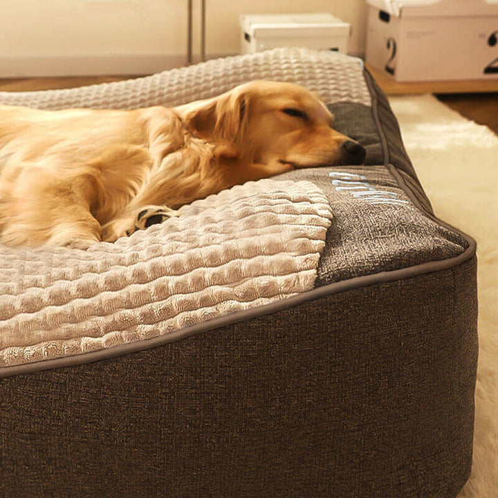 Durable large gray orthopedic dog bed, perfect for pet comfort. Features neck support & washable cover.