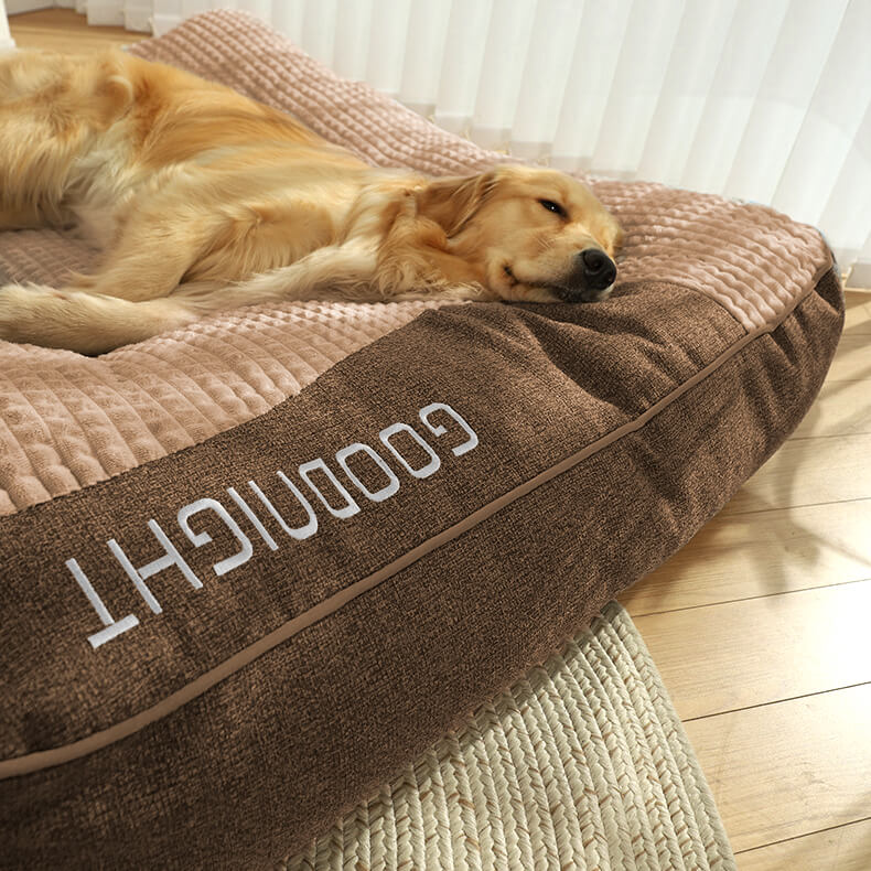 Luxury large orthopedic dog bed with neck support & washable cover, ensuring pet comfort and spinal health.