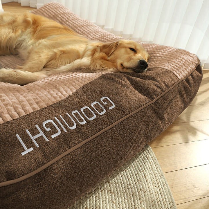Luxury large orthopedic dog bed with neck support & washable cover, ensuring pet comfort and spinal health.