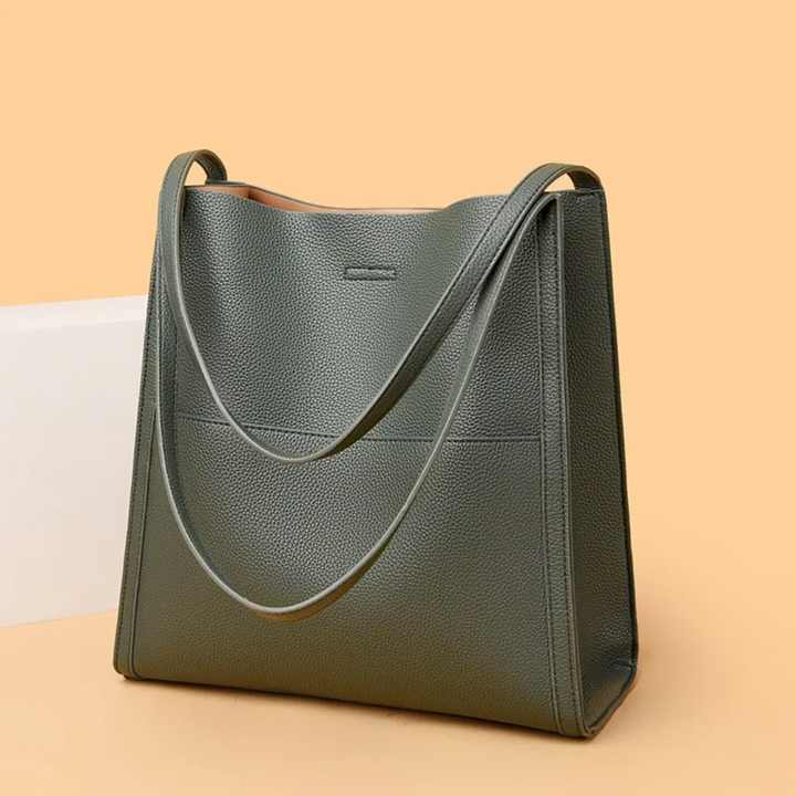 Versatile women's large leather tote, a fashionable everyday purse for work, travel, or casual outings.