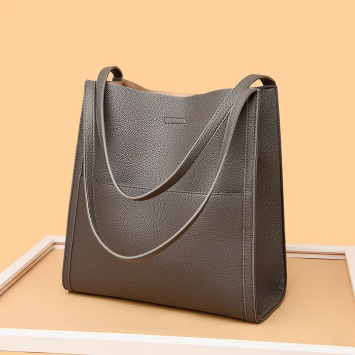 Stylish women's leather shoulder bag with large capacity, an elegant design for fashion-forward women.