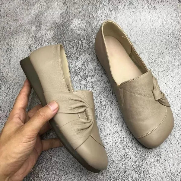 Elegant comfort fit loafers for women, designed with a wedge heel & shock absorbing sole.