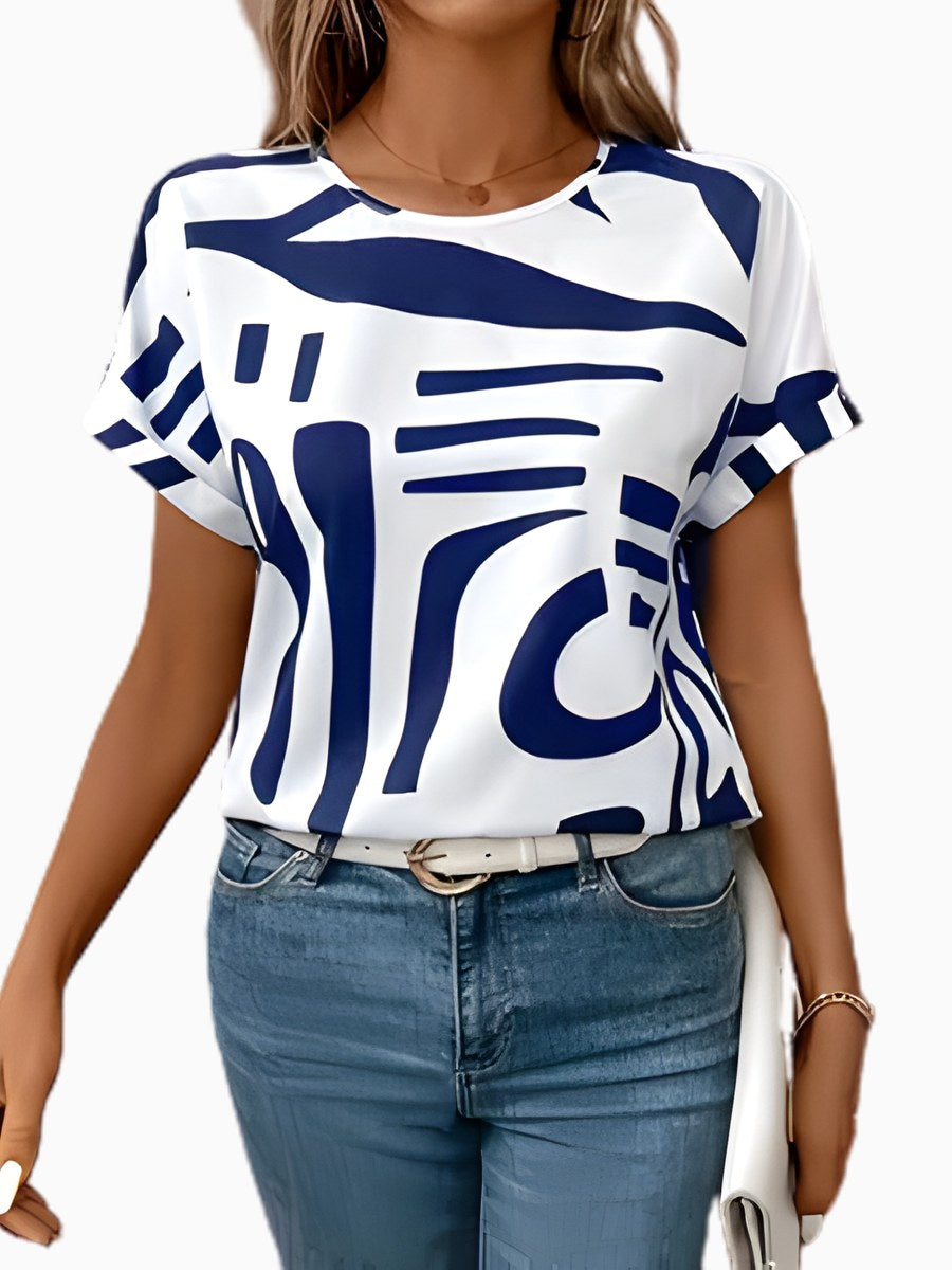 Women's relaxed fit t-shirt with unique abstract print. Comfortable casual top for everyday summer style.