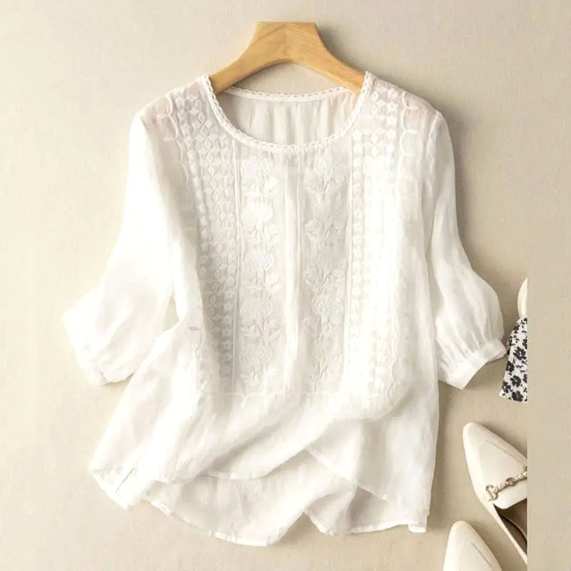 Women's relaxed fit floral blouse for summer, perfect for chic casual wear & everyday style. Lightweight & comfortable.