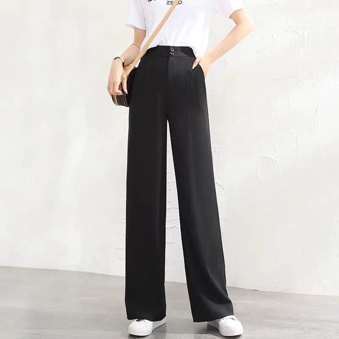 Flowy wide leg women's pants with a high waist for a relaxed fit, perfect for summer fashion.