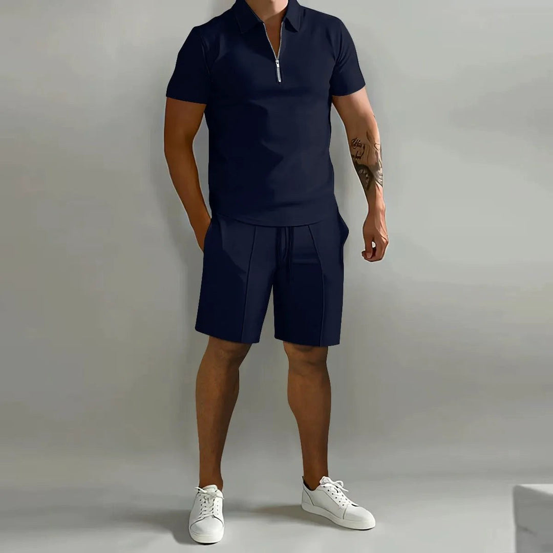 Soft fabric detail of men's zip-neck polo and shorts lounge set, emphasizing ultimate comfort and quality.