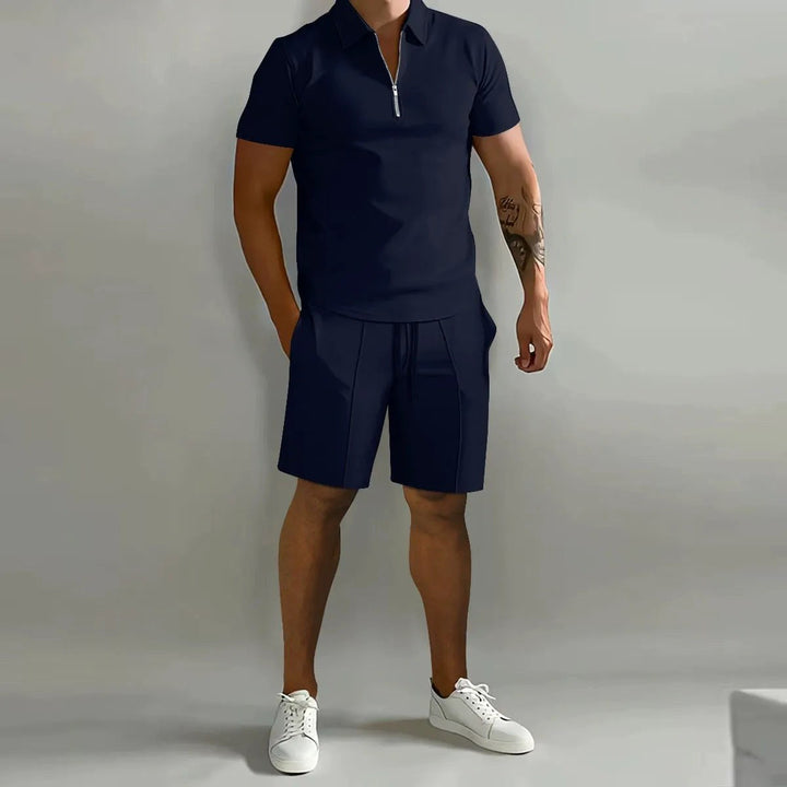 Soft fabric detail of men's zip-neck polo and shorts lounge set, emphasizing ultimate comfort and quality.