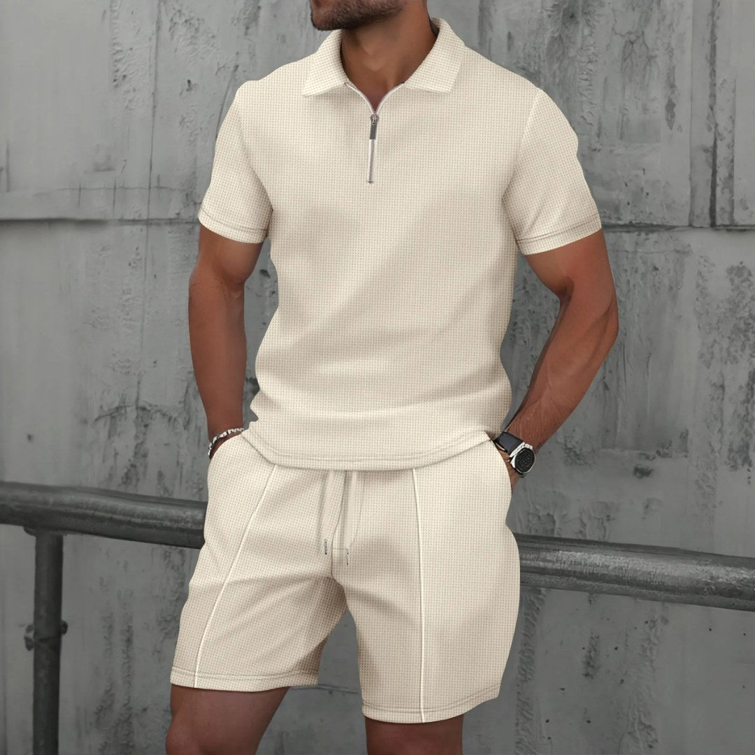 Comfortable men's relaxed fit zip-neck polo and drawstring shorts set. Perfect lounge wear for summer travel.