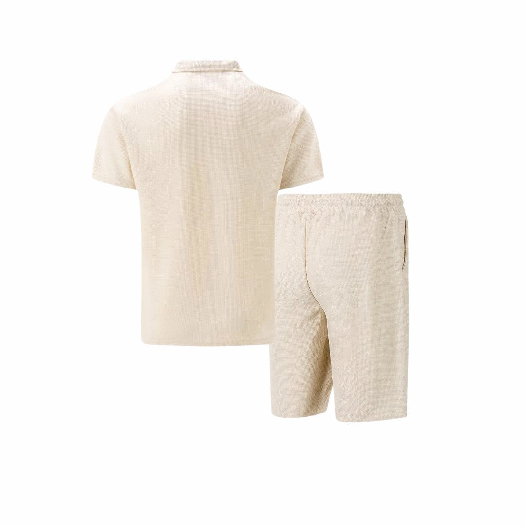 Men's zip-neck polo with matching drawstring shorts, a modern casual outfit. Comfortable for all-day wear.