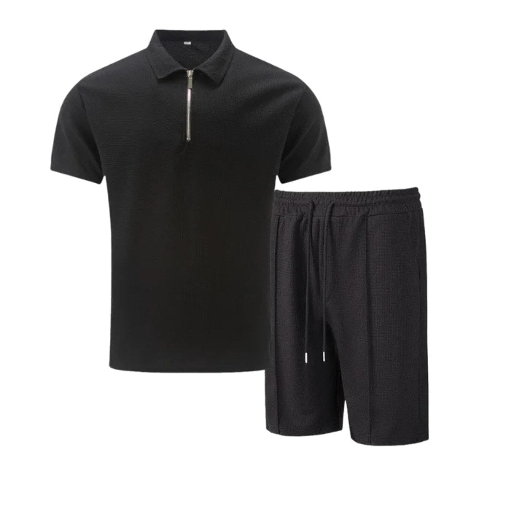 Close-up of men's zip-neck polo, highlighting the collar & fabric. Part of a comfortable lounge wear set.