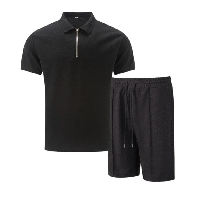 Close-up of men's zip-neck polo, highlighting the collar & fabric. Part of a comfortable lounge wear set.