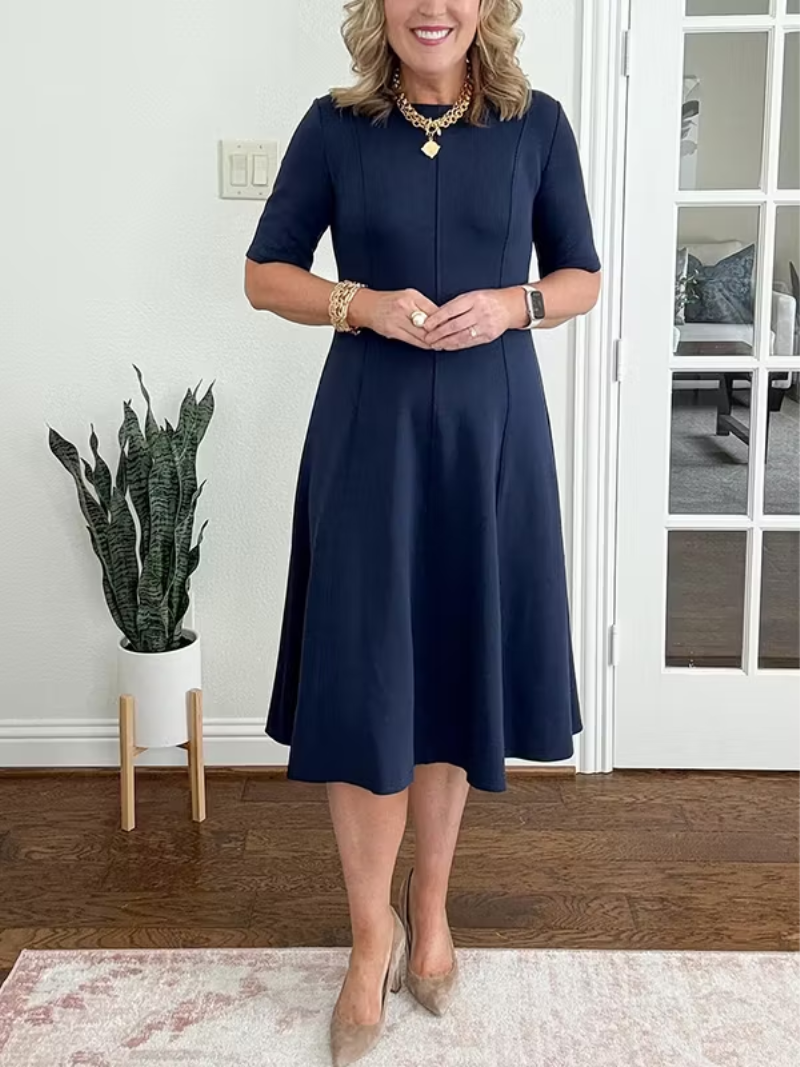 Elegant women's fit-and-flare midi cocktail dress with half sleeves, perfect for parties & formal occasions.