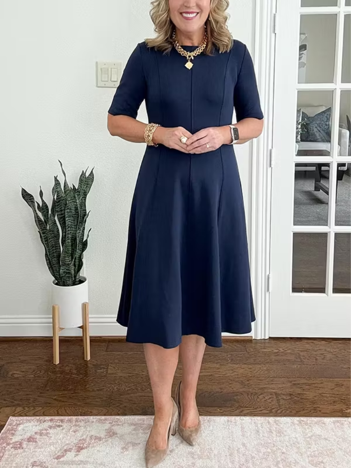 Elegant women's fit-and-flare midi cocktail dress with half sleeves, perfect for parties & formal occasions.