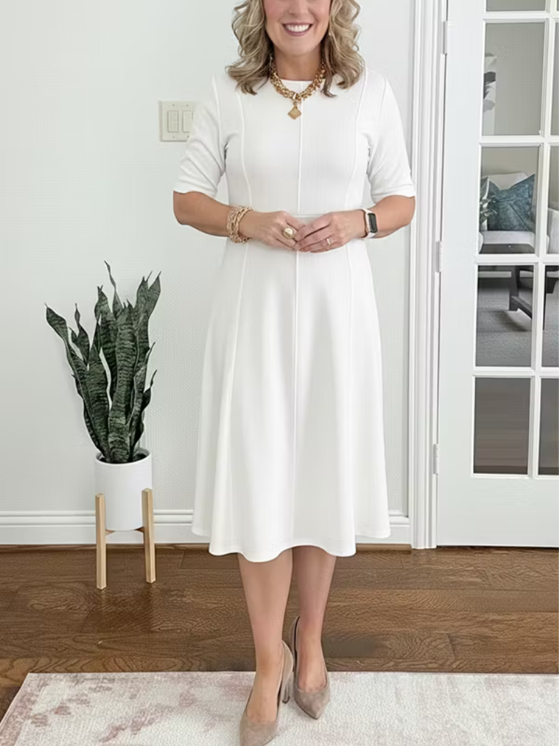 Formal women's fit-and-flare midi dress, elegant half sleeve design for cocktail events & evening wear.
