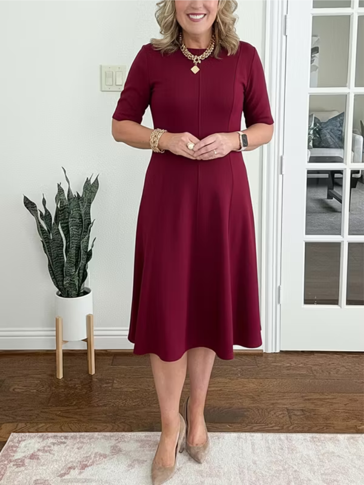 Beautiful women's elegant fit-and-flare cocktail midi dress, perfect for parties and formal occasions.