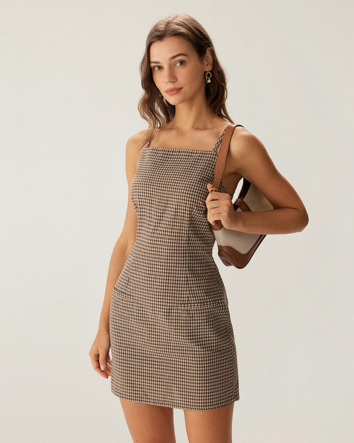 Summer-ready brown gingham mini dress for women, with adjustable spaghetti straps for a comfortable, chic fit.