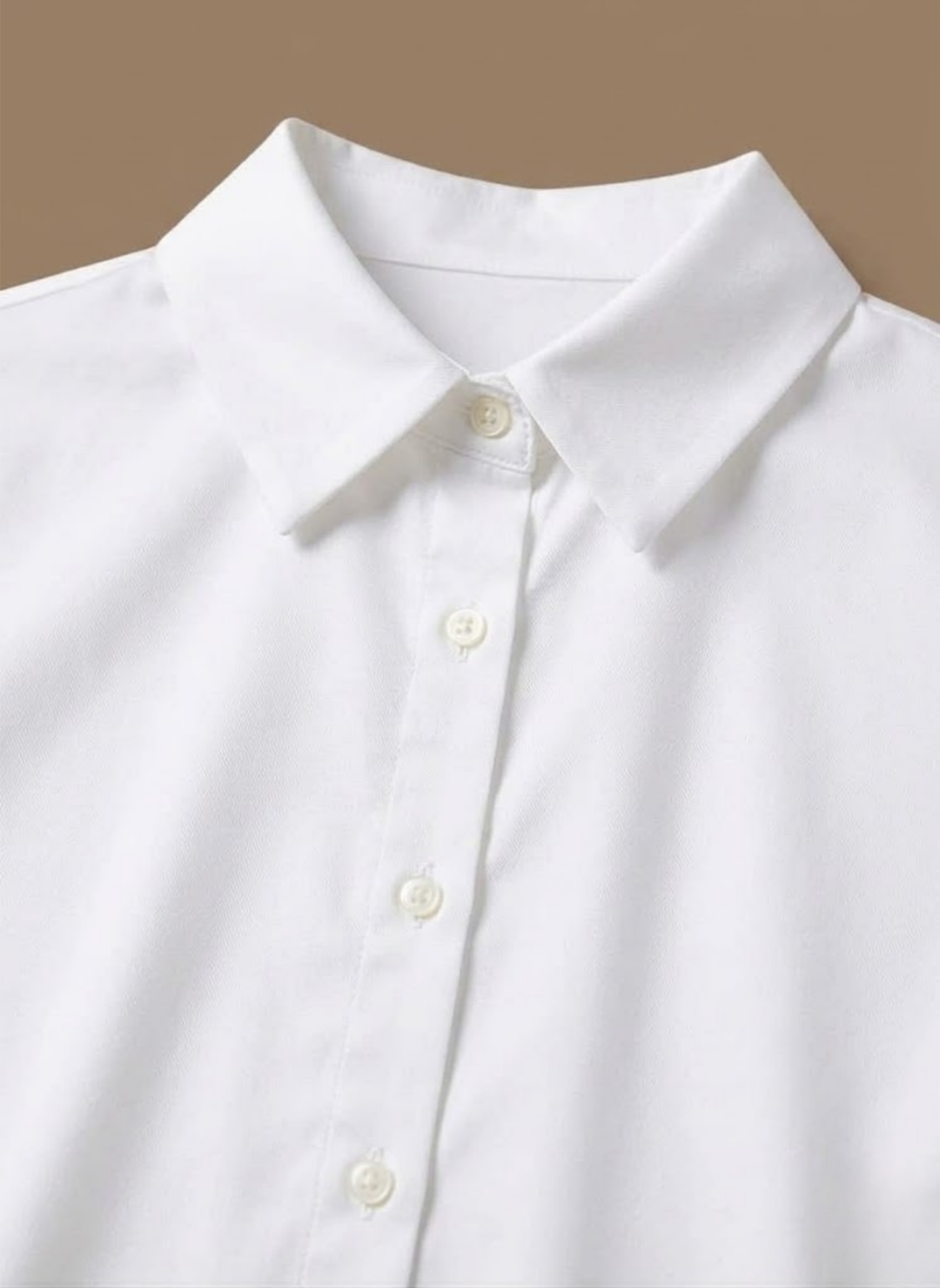Effortless style women's button-up blouse, versatile for office & professional attire.