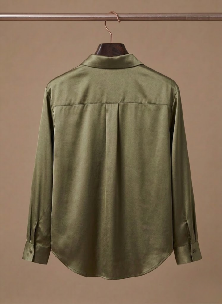 Classic button-up women's blouse, designed for professional and chic office outfits.