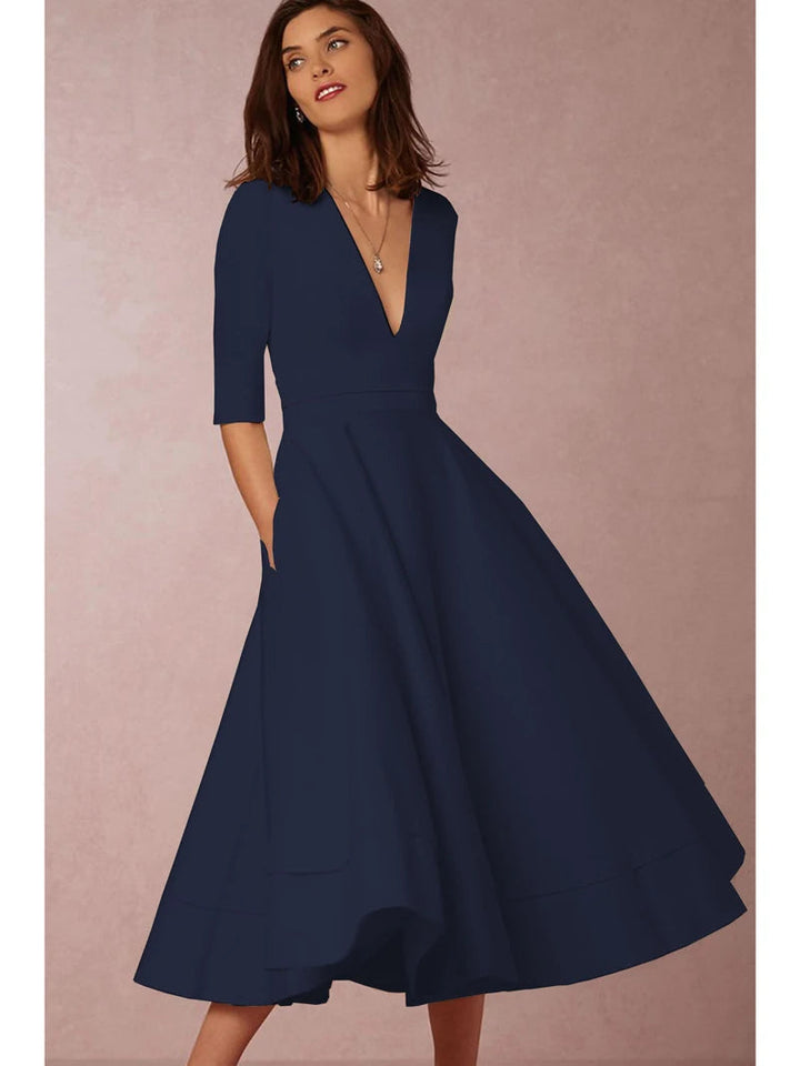 Women's comfortable & stylish A-line V-neck midi dress. Great for parties, formal gatherings, and sophisticated wear.