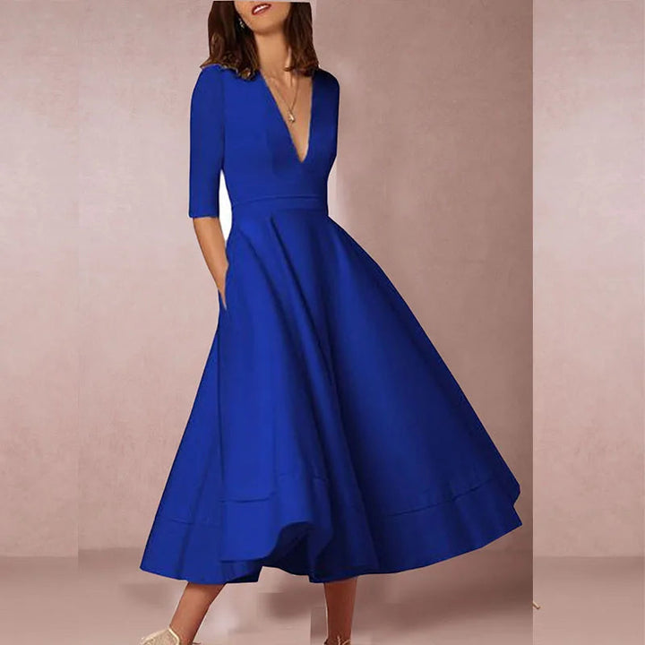 Beautiful A-line midi dress for women, featuring a classic V-neck. A versatile choice for formal parties or events.