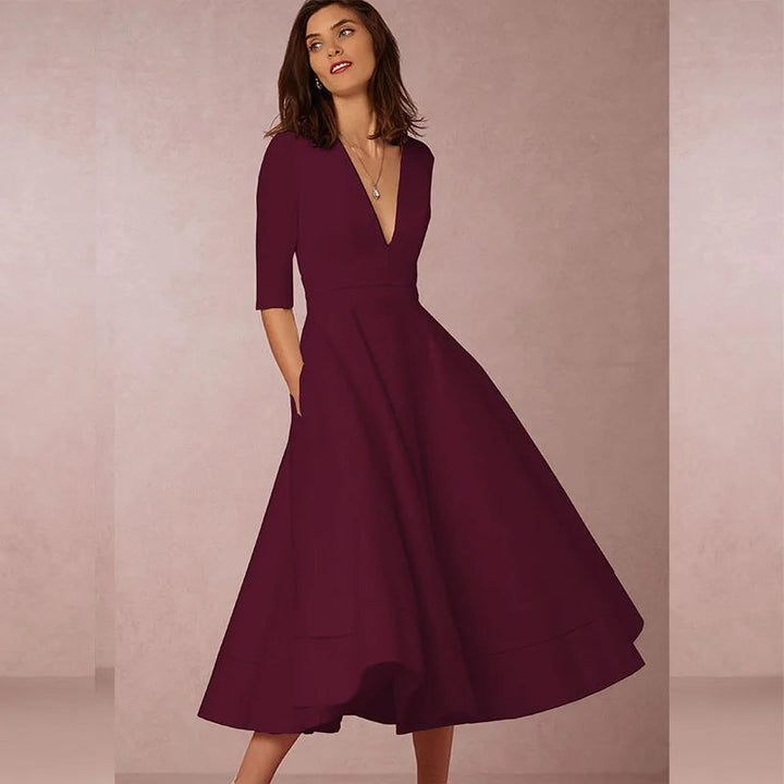 Elegant women's A-line midi dress with V-neck. Perfect for sophisticated occasions, evening events, and wedding guests.