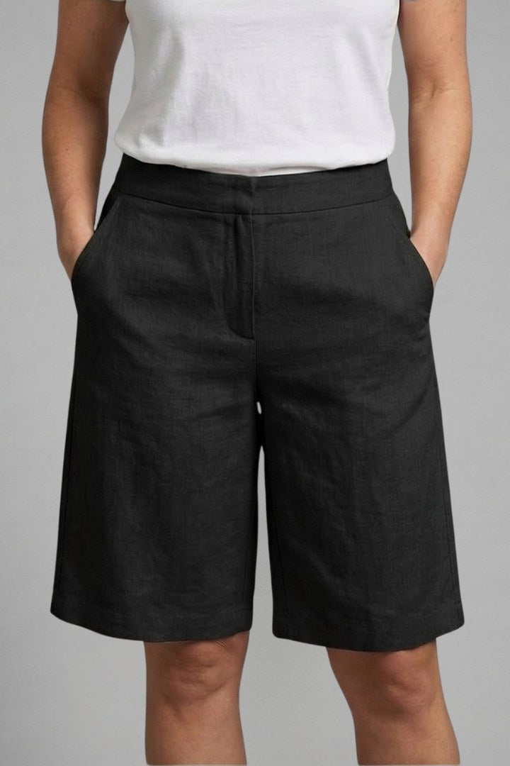 Straight leg women's high-waist shorts, knee-length with practical pockets, versatile for casual summer outfits.