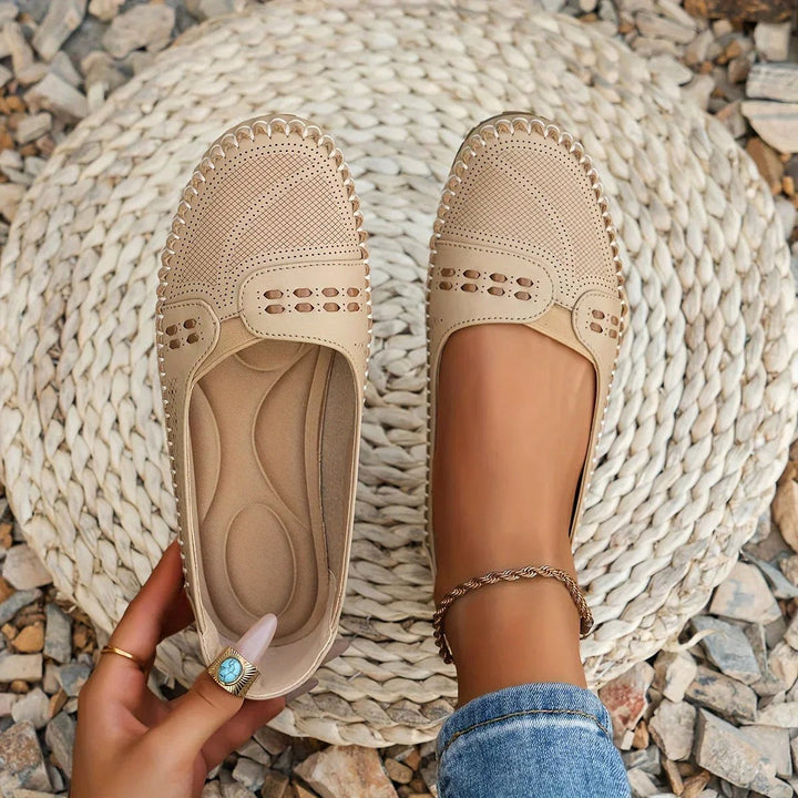 Women's orthopedic comfort flats in a versatile design, offering arch support for everyday wear & pain relief.