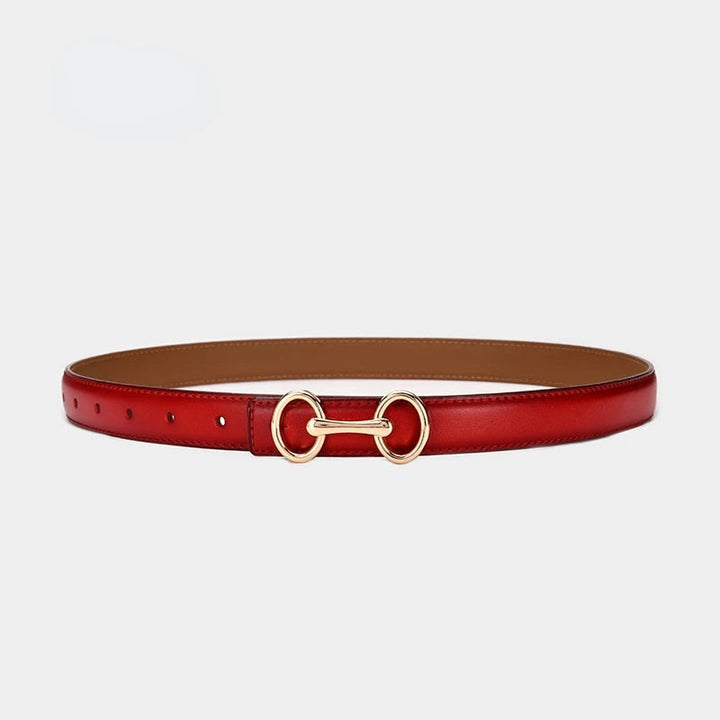 Versatile women's dress belt in rich caramel leather, enhanced with a beautiful Celtic buckle for a stylish look.