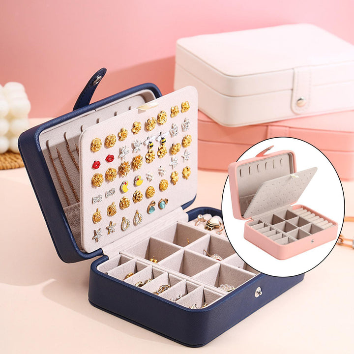 Luxurious leather flip-top jewelry box, ideal for women's organized storage and display.