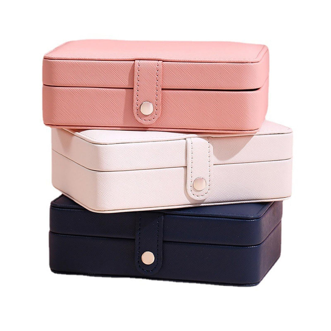 Blue elegant flip-top jewelry organizer, a thoughtful gift for her and secure storage.