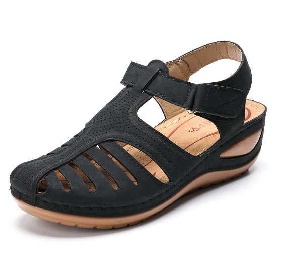 Women's elegant orthopedic sandals with a wedge heel, closed toe, and maximum comfort for summer.