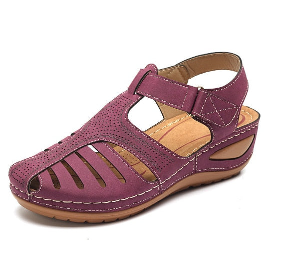 Women's orthopedic wedge sandals with closed toe & adjustable strap for summer comfort.
