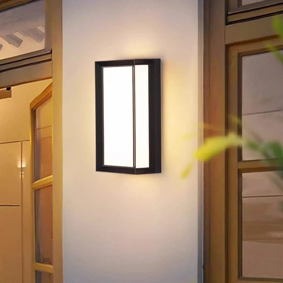Smart LED wall light featuring motion detection for outdoor use. Modern design, energy-saving, & robust for exterior.