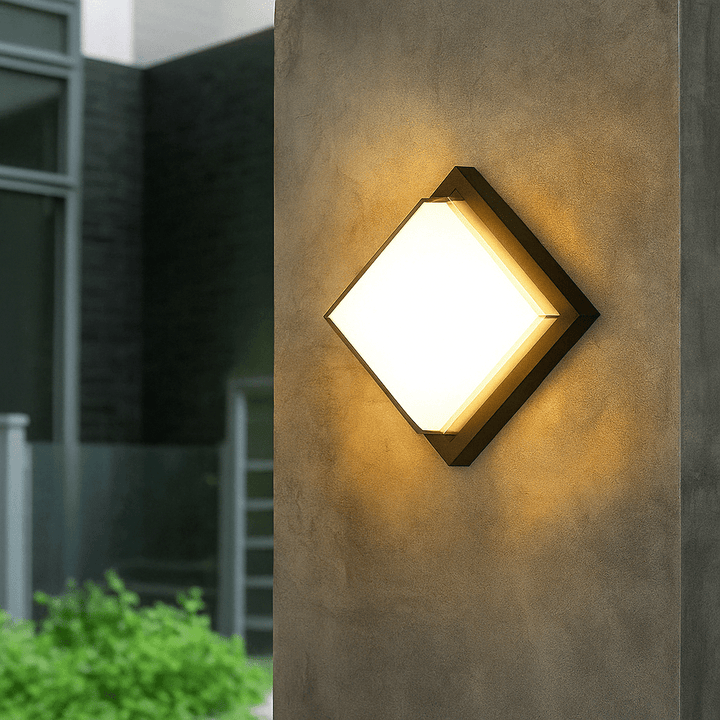 Durable outdoor LED security light with smart motion sensor, a modern wall sconce enhancing safety & exterior decor.