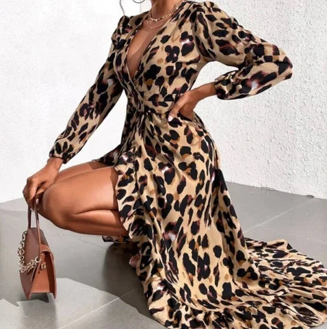 Trendy women's leopard print midi dress with a V-neck and long sleeves, a stylish choice for fashion lovers.