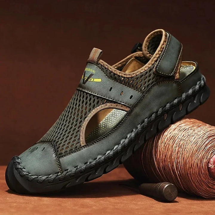 Closed-toe men's sports sandals. Orthopedic design with arch support for walking & casual comfort. Durable active footwear.