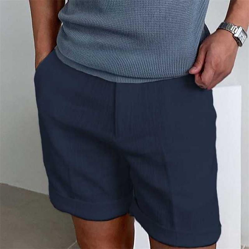 Men's summer linen shorts with rolled cuffs, ideal for beach days or casual outings.