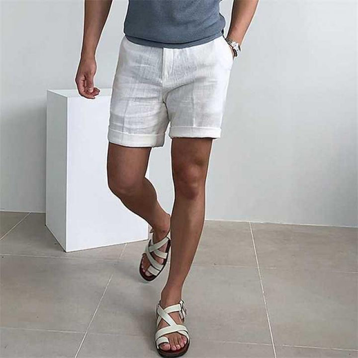 Polished rolled-cuff linen shorts for men, offering stylish and casual summer comfort.