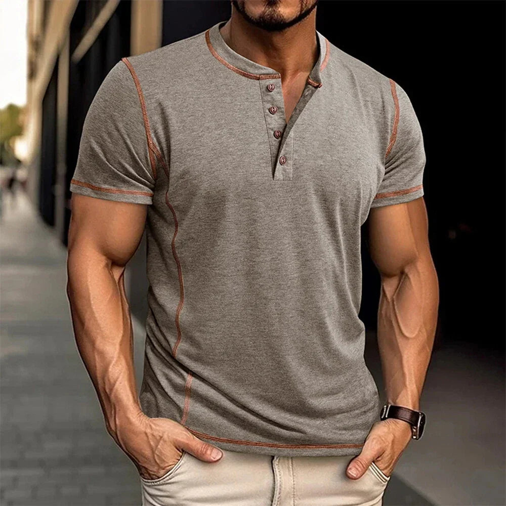 Relaxed fit men's Henley top, short sleeve design ideal for summer and casual outfits.
