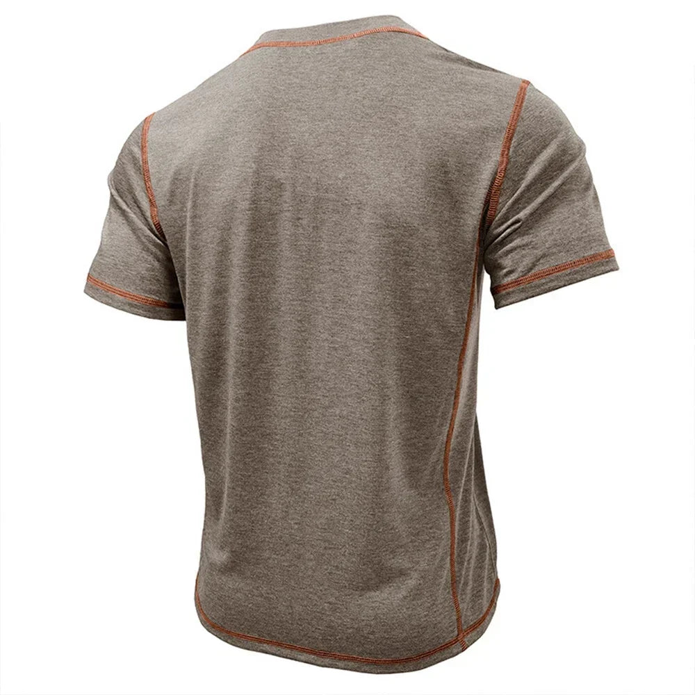 Modern men's relaxed fit short sleeve Henley, essential for a versatile casual wardrobe.