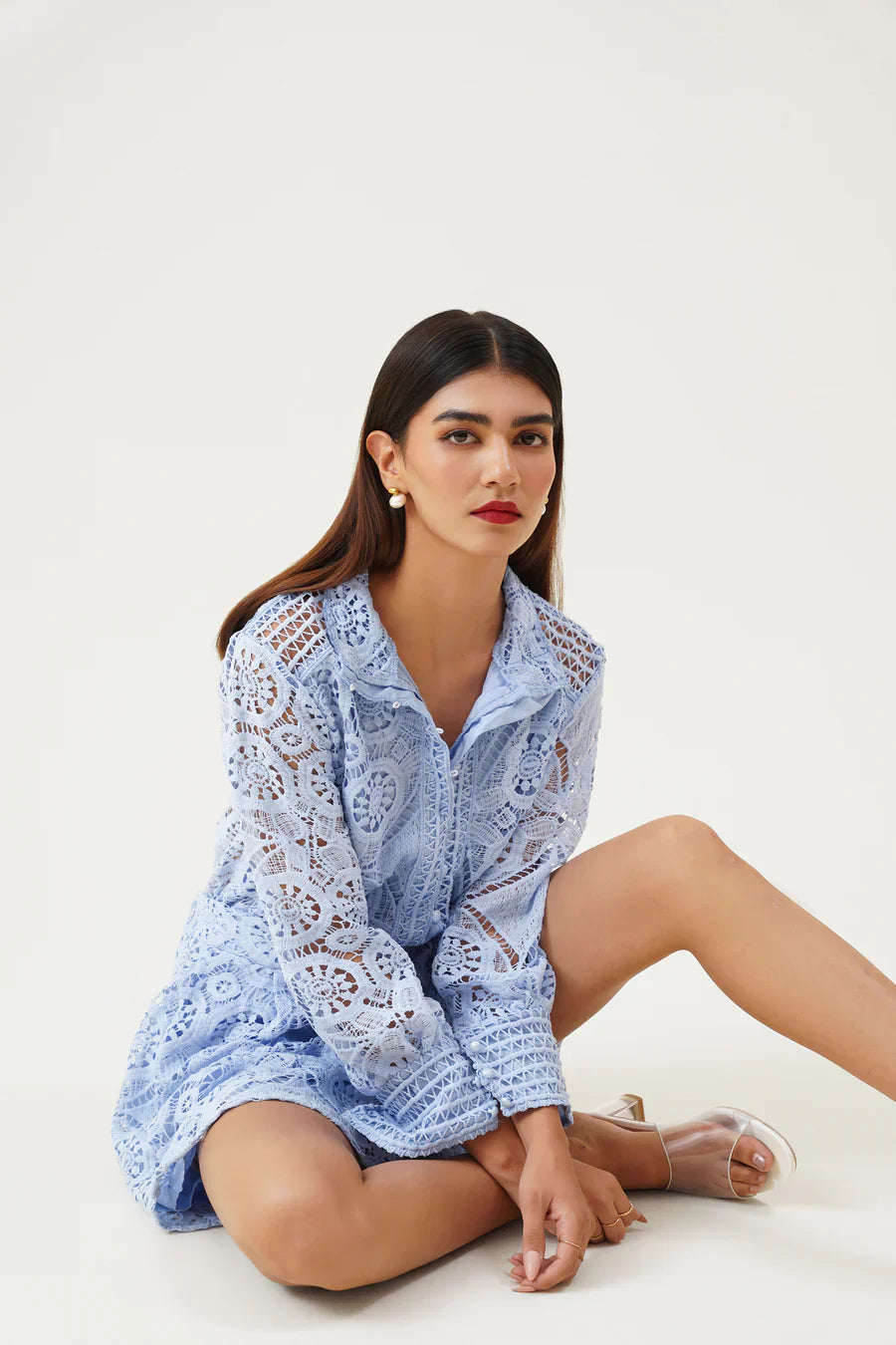 Light blue women's formal playsuit with chic puff sleeves & button front, perfect for elegant business wear.