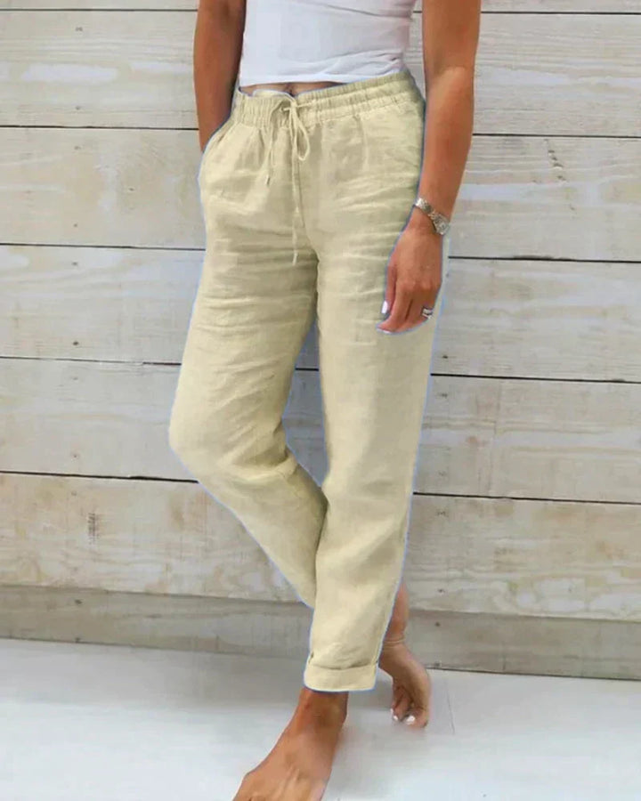 Lightweight linen blend trousers for women, ideal for breezy summer days & relaxed spring casual wear.
