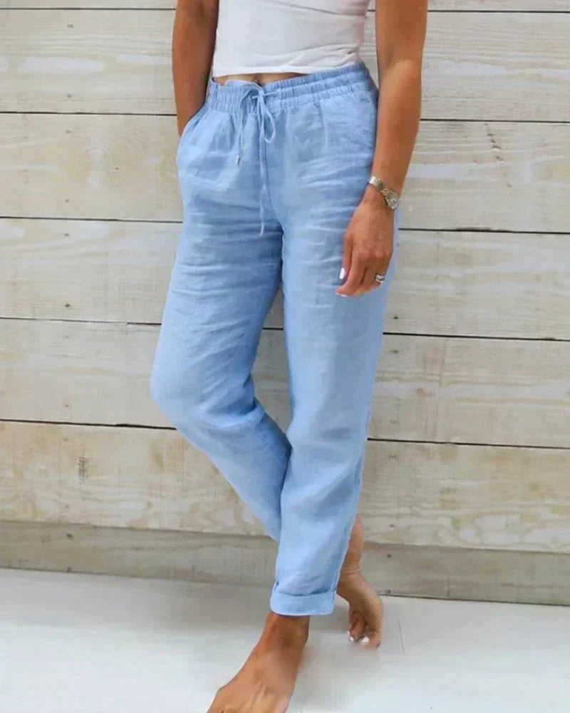 Women's breezy relaxed fit linen trousers for ultimate summer comfort & casual style. Perfect for spring fashion.