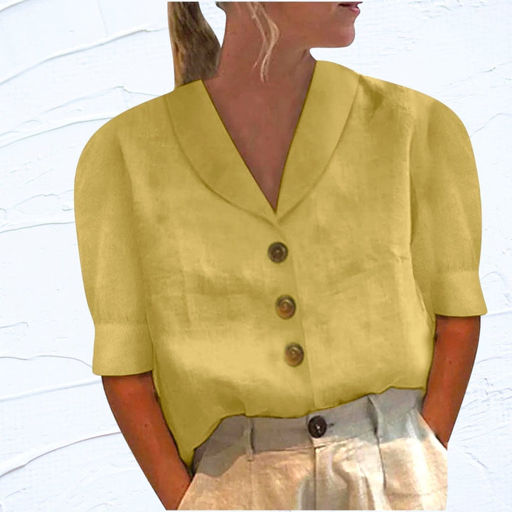 Relaxed fit V-neck cap sleeve blouse for women, offering effortless style and comfort for various occasions.